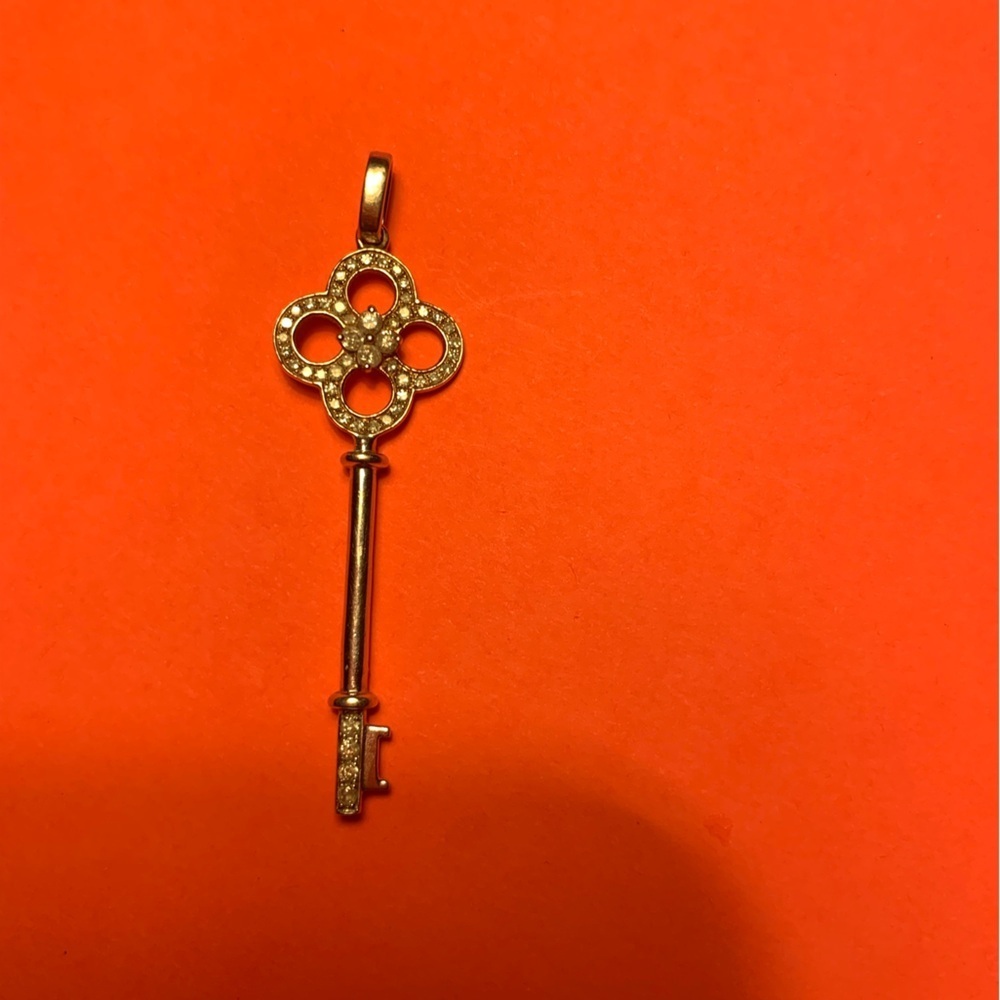 Stamped 10K Yellow and White Gold Key Embellished with Diamonds Pendant